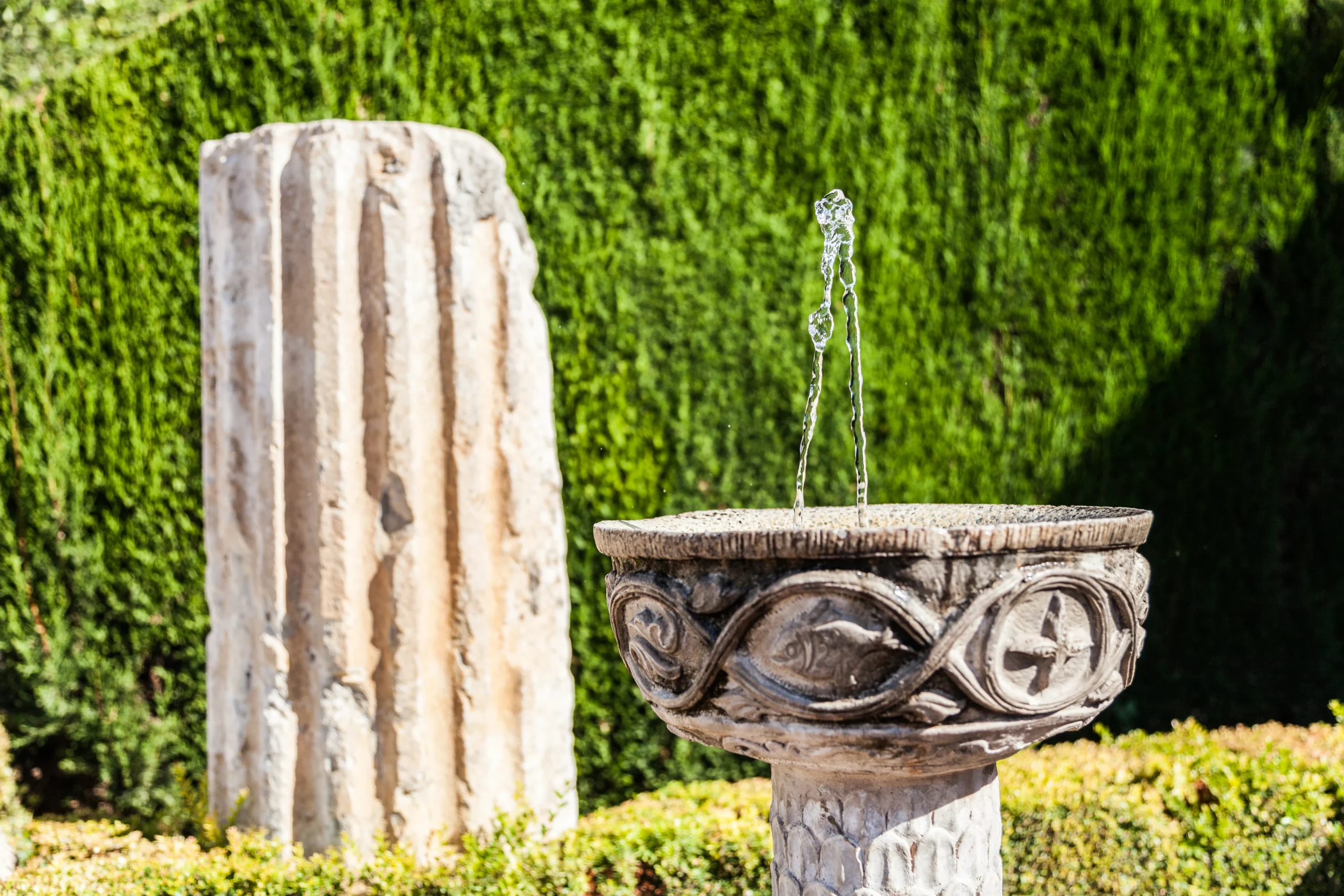 Roman ruins used as garden furniture in Italy