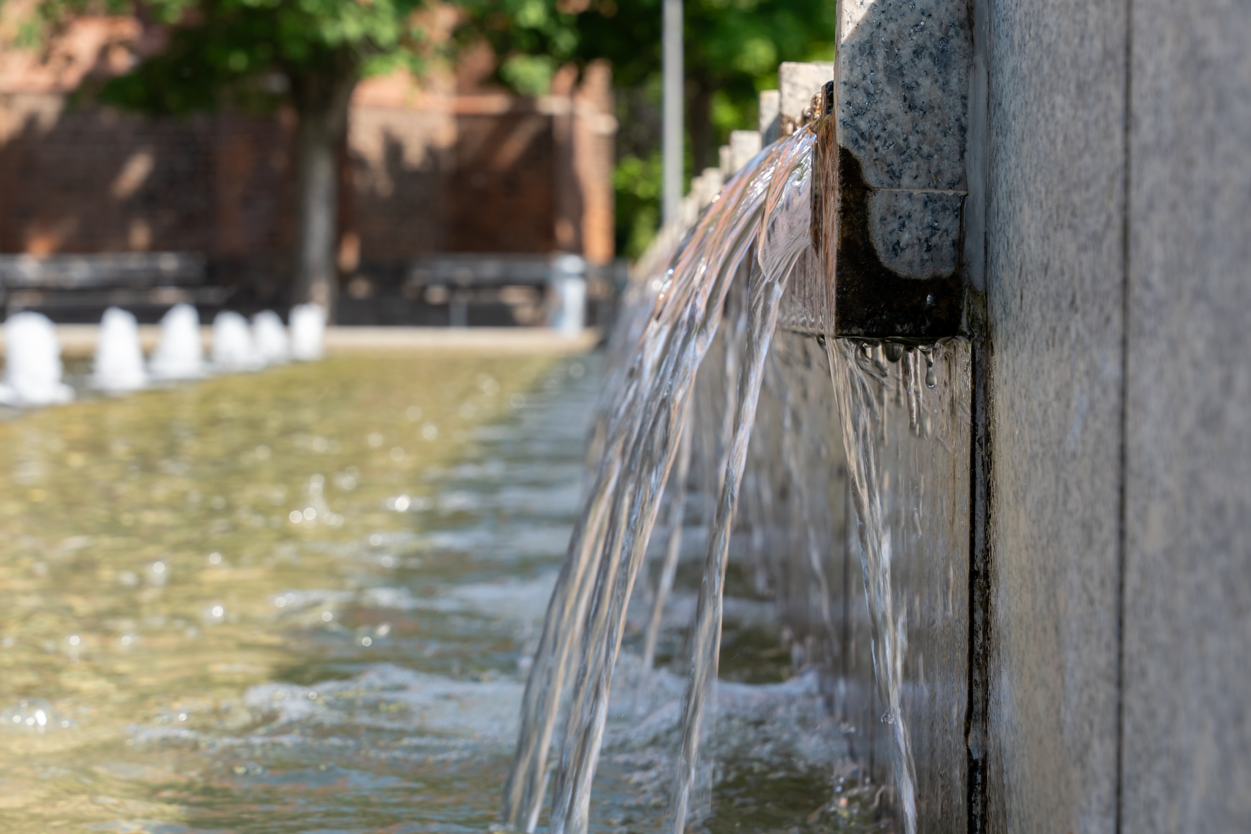 A fountain with water flowing out of it
